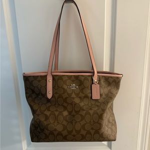 Brown and baby pink coach purse